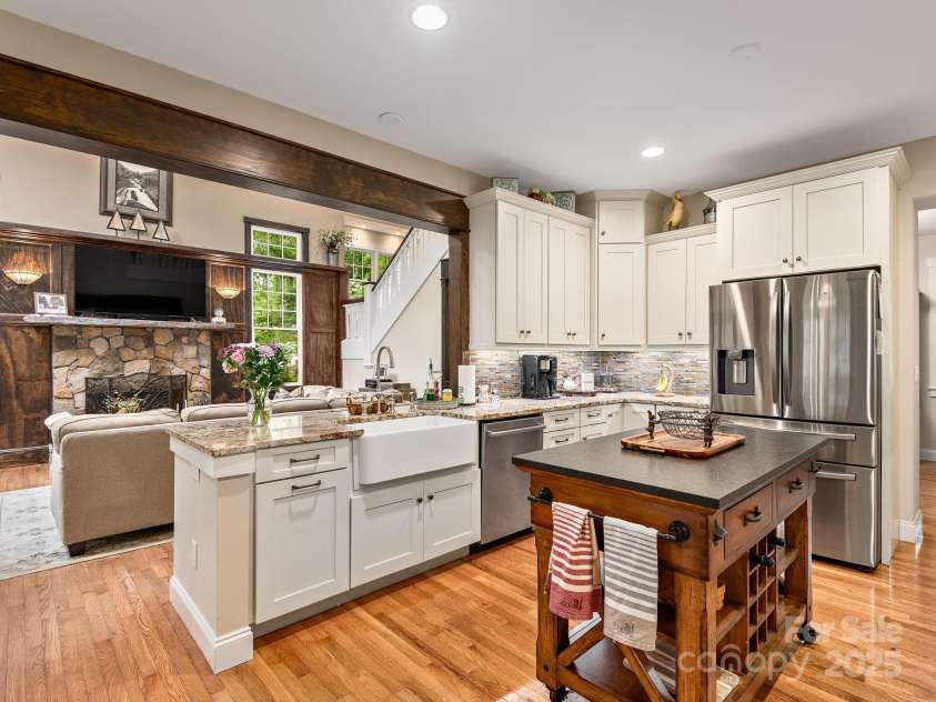 15 Bonnies Lane, Asheville, NC 28803.  MLS# CAR4252426, YatesRealty ID 14917. Gourmet kitchen open to the living room so you can stay connected with the rest of your guests.