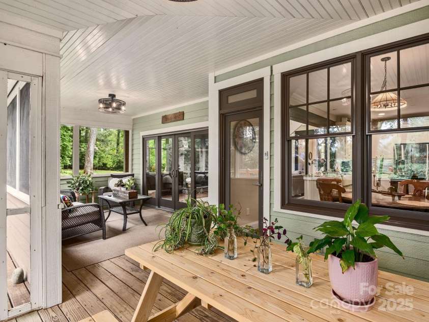 15 Bonnies Lane, Asheville, NC 28803.  MLS# CAR4252426, YatesRealty ID 14917. Same large screened in porch with outdoor dining area.