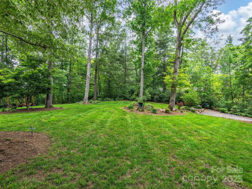 15 Bonnies Lane, Asheville, NC 28803.  MLS# CAR4252426, YatesRealty ID 14917. Wonderful side yard.