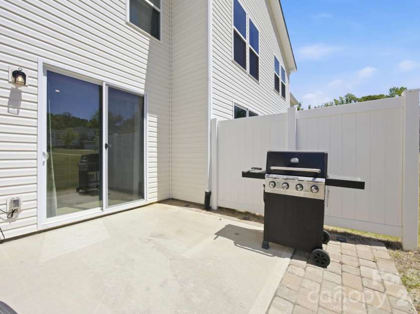 15617 Little Bluestem Street, Charlotte, NC 28278.  MLS# CAR4373465, YatesRealty ID 14925. Vinyl privacy screens on both sides of the patio