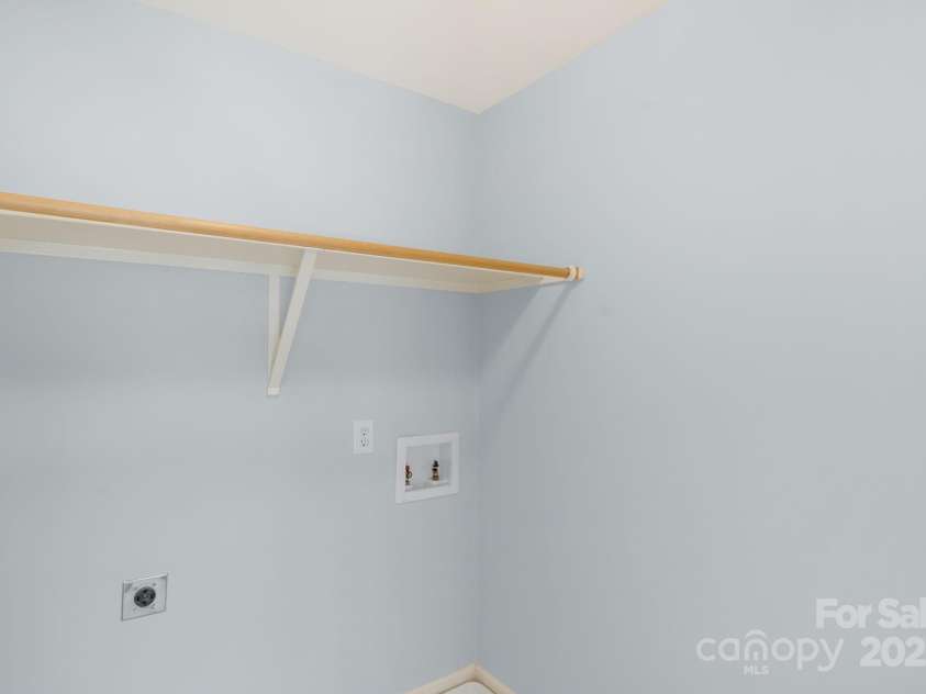3109 Savannah Hills Drive, Matthews, NC 28105.  MLS# CAR4239036, YatesRealty ID 14925. Upstairs Laundry