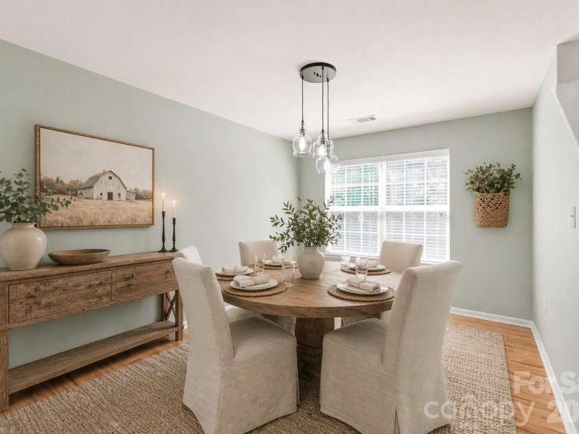 4166 Cordell Court, Midland, NC 28107.  MLS# CAR4373907, YatesRealty ID 14926. Bright and Airy Dining Room with Updated Lighting -Decor has been virtually added