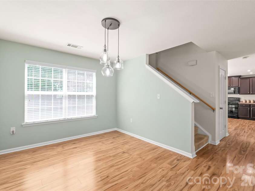 4166 Cordell Court, Midland, NC 28107.  MLS# CAR4373907, YatesRealty ID 14926. Dining Room with Updated Lighting
