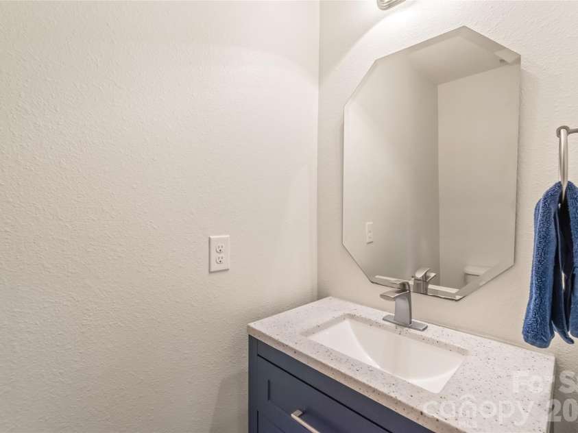 4166 Cordell Court, Midland, NC 28107.  MLS# CAR4373907, YatesRealty ID 14926. Half Bath with Updated Vanity
