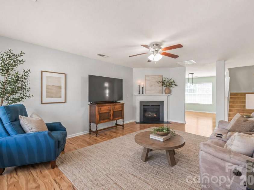 4166 Cordell Court, Midland, NC 28107.  MLS# CAR4373907, YatesRealty ID 14926. Spacious Living Room with Gas Log Fireplace - Decor has been virtually added