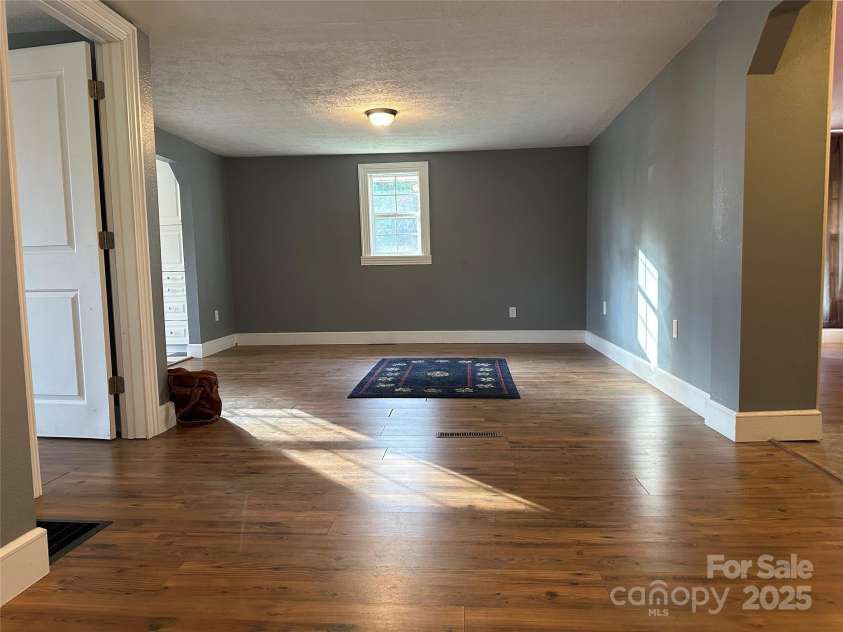 57 Eden Brook Drive, Canton, NC 28716.  MLS# CAR4247432, YatesRealty ID 14926. Living room