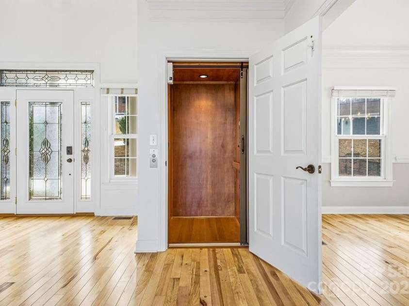 38 Sweetwater Oaks Drive, Fletcher, NC 28732.  MLS# CAR4331629, YatesRealty ID 1493. Elevator serves all 3 levels.  Main level here.
