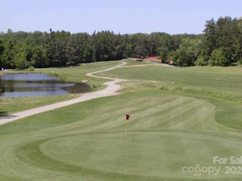 1610 Ford Street, Charlotte, NC 28216.  MLS# CAR4257993, YatesRealty ID 14930. And a cool golf course ...