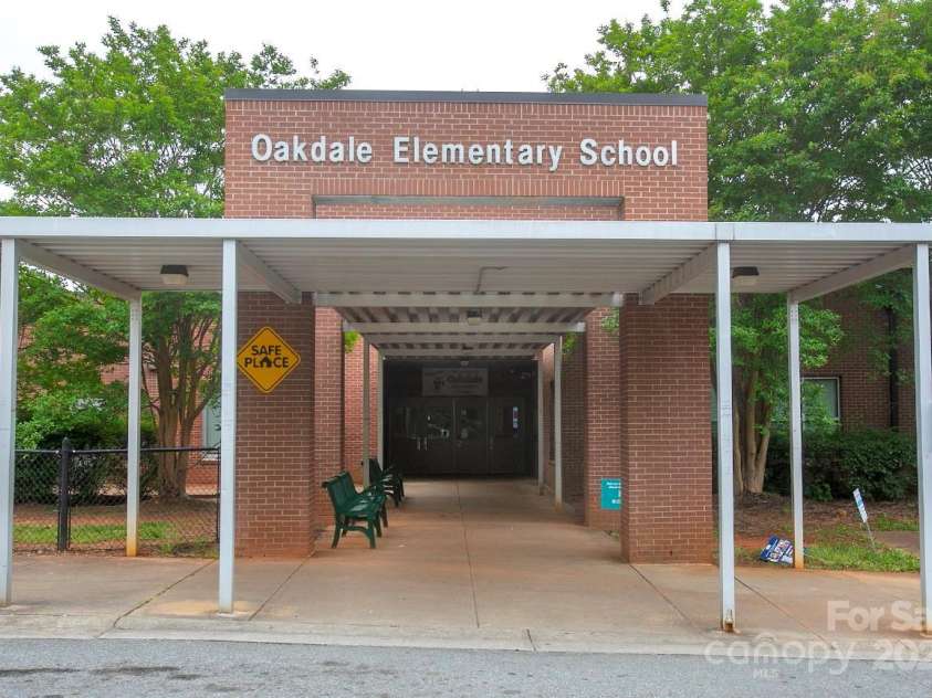 1610 Ford Street, Charlotte, NC 28216.  MLS# CAR4257993, YatesRealty ID 14930. And you can walk to the elementary school.
