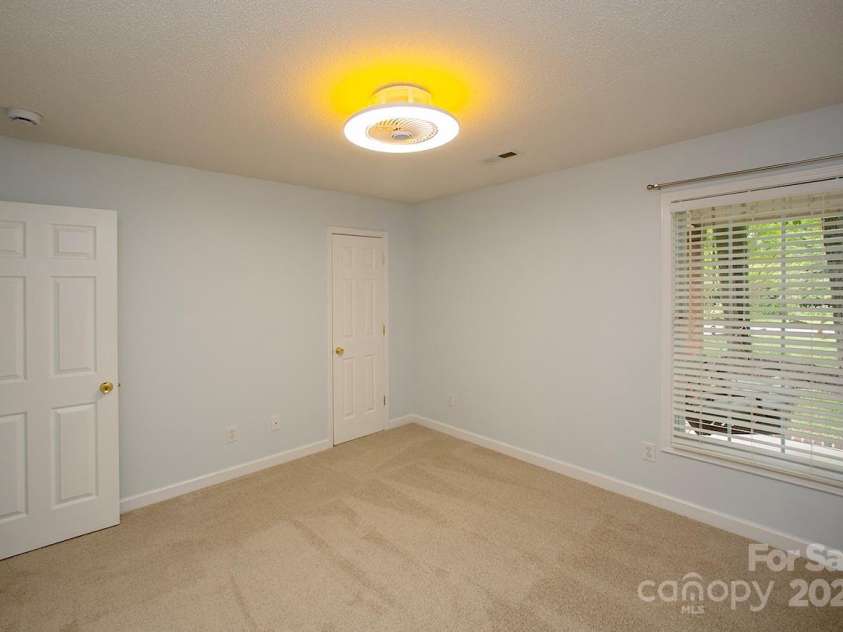 1610 Ford Street, Charlotte, NC 28216.  MLS# CAR4257993, YatesRealty ID 14930. Bedroom 2 has new carpet and is 12 by 11'4