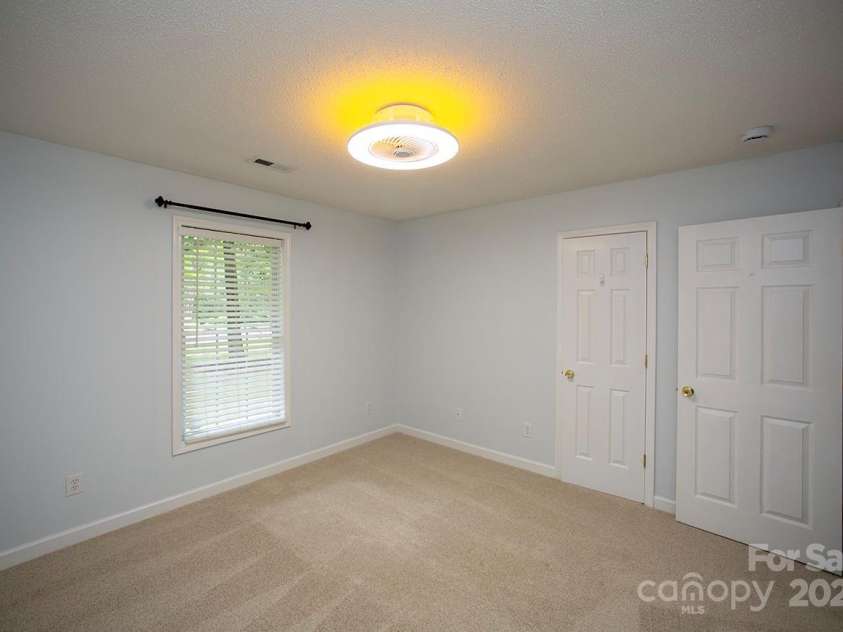 1610 Ford Street, Charlotte, NC 28216.  MLS# CAR4257993, YatesRealty ID 14930. Bedroom 3 has new carpet and is 12 by 11'4