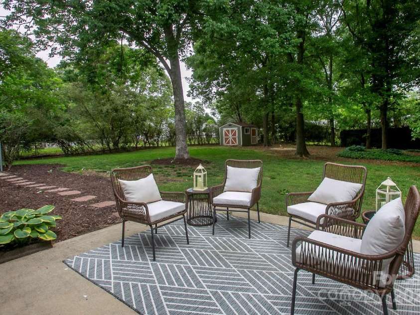 1610 Ford Street, Charlotte, NC 28216.  MLS# CAR4257993, YatesRealty ID 14930. Imagine hosting BBQs on this cool, shaded patio.