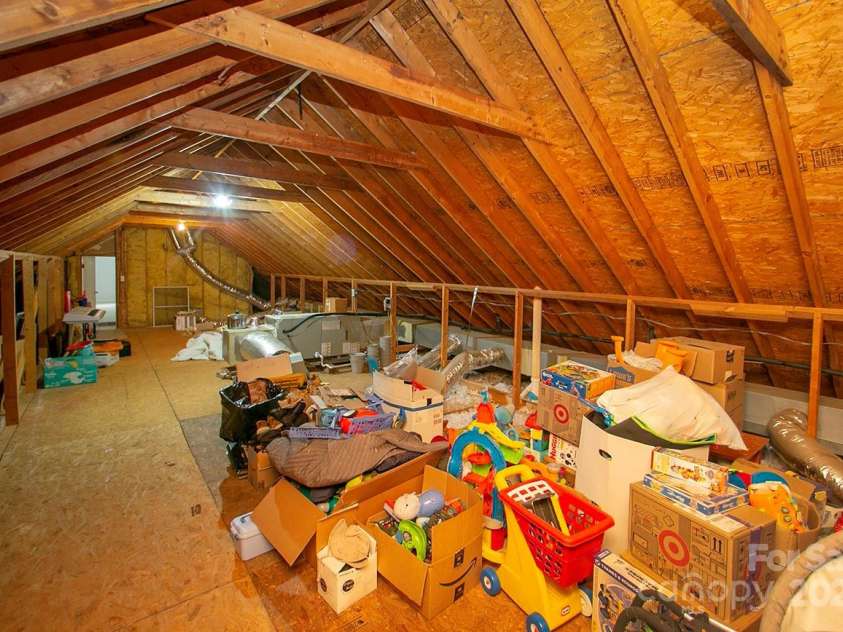 1610 Ford Street, Charlotte, NC 28216.  MLS# CAR4257993, YatesRealty ID 14930. Oh, and off the bonus room, you have a MASSIVE walk-in attic space -- 494 square feet. Wow.