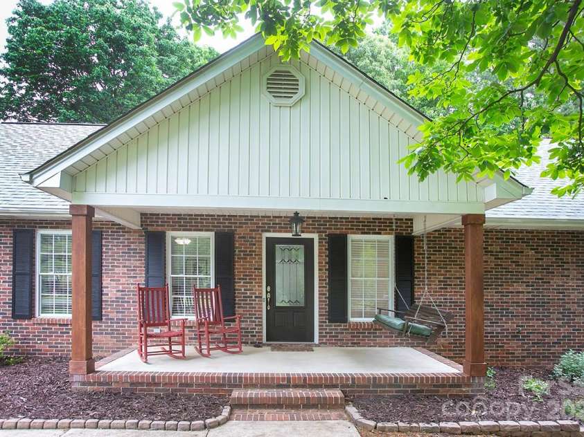 1610 Ford Street, Charlotte, NC 28216.  MLS# CAR4257993, YatesRealty ID 14930. You'll love greeting family and friends on your large covered front porch.