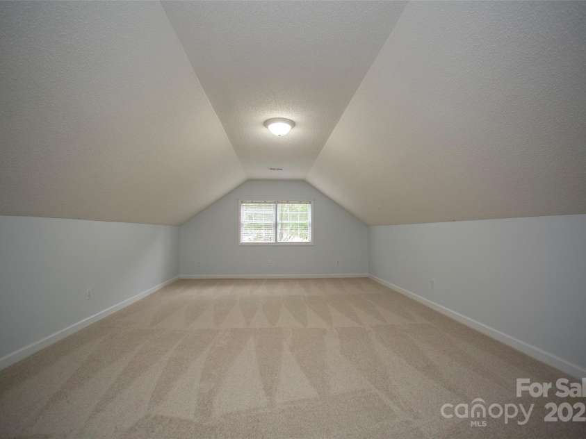 1610 Ford Street, Charlotte, NC 28216.  MLS# CAR4257993, YatesRealty ID 14930. Your new bonus room is HUGE at 24'3