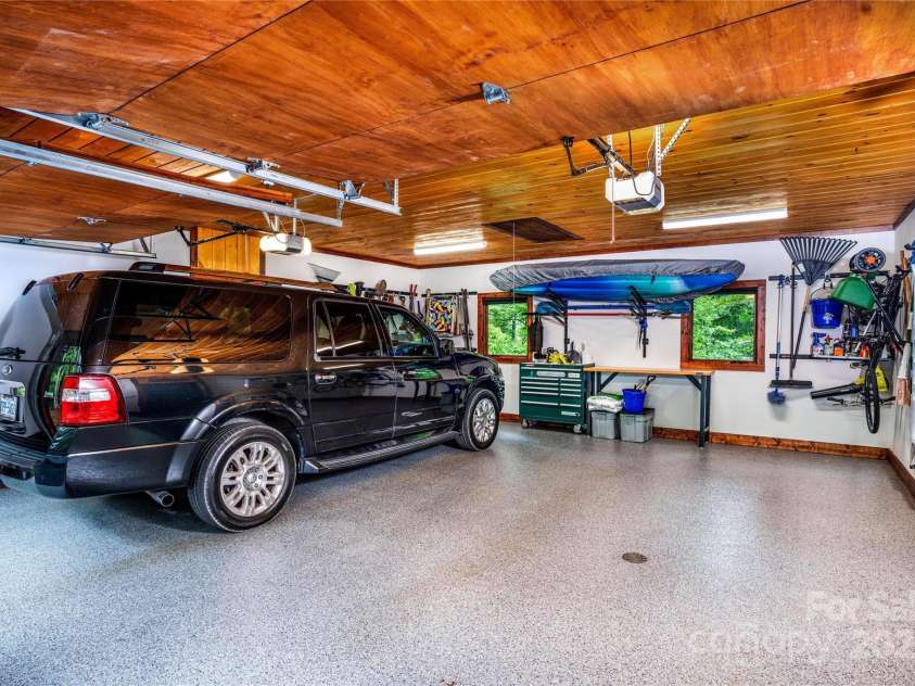 2126 Sycamore Drive, Nebo, NC 28761.  MLS# CAR4217121, YatesRealty ID 14931. Deep two car garage.
