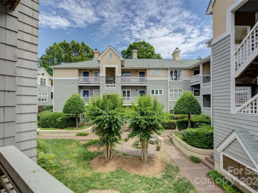 226 Queens Road, Charlotte, NC 28204.  MLS# CAR4261070, YatesRealty ID 14935. Courtyard view from covered patio