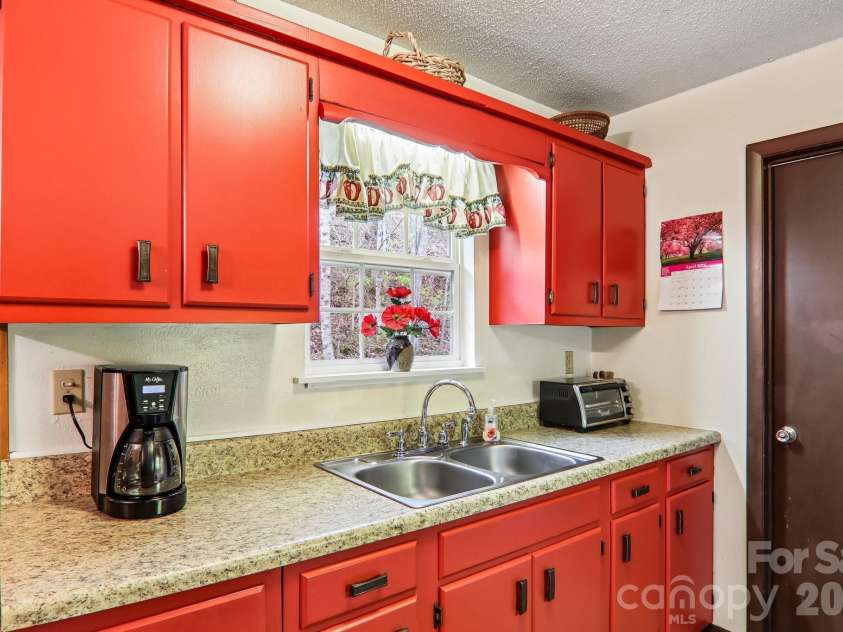 28 Mull Cove Road, Maggie Valley, NC 28751.  MLS# CAR4373936, YatesRealty ID 14935. 