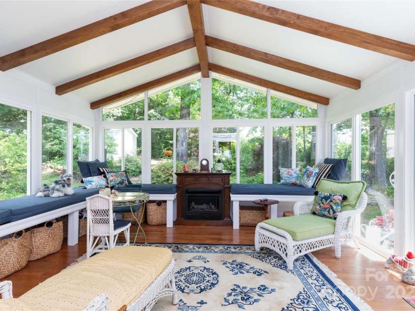 50 Appleola Road, Hendersonville, NC 28792.  MLS# CAR4262656, YatesRealty ID 14936. 4-Season Sunroom