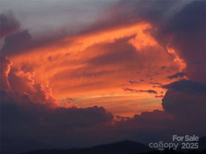 50 Appleola Road, Hendersonville, NC 28792.  MLS# CAR4262656, YatesRealty ID 14936. Abundant Sunsets