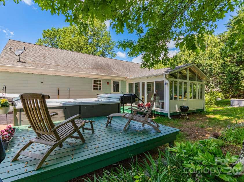 50 Appleola Road, Hendersonville, NC 28792.  MLS# CAR4262656, YatesRealty ID 14936. Back Deck with Swim Spa