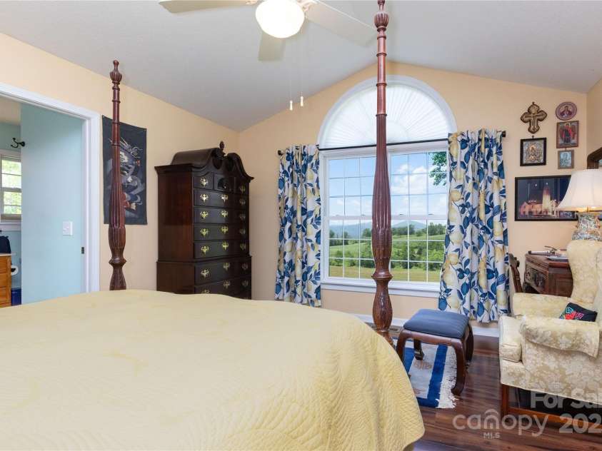50 Appleola Road, Hendersonville, NC 28792.  MLS# CAR4262656, YatesRealty ID 14936. Primary Bedroom