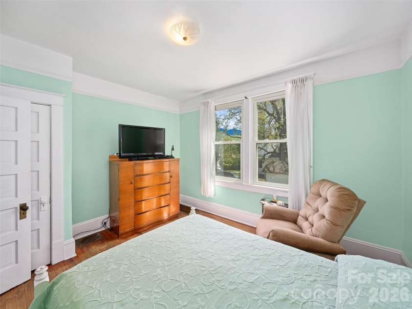 45 Summit Street, Burnsville, NC 28714.  MLS# CAR4372518, YatesRealty ID 14938. Primary Downstairs Bedroom