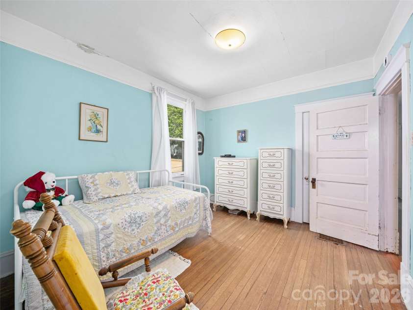 45 Summit Street, Burnsville, NC 28714.  MLS# CAR4372518, YatesRealty ID 14938. Third Downstairs Bedroom