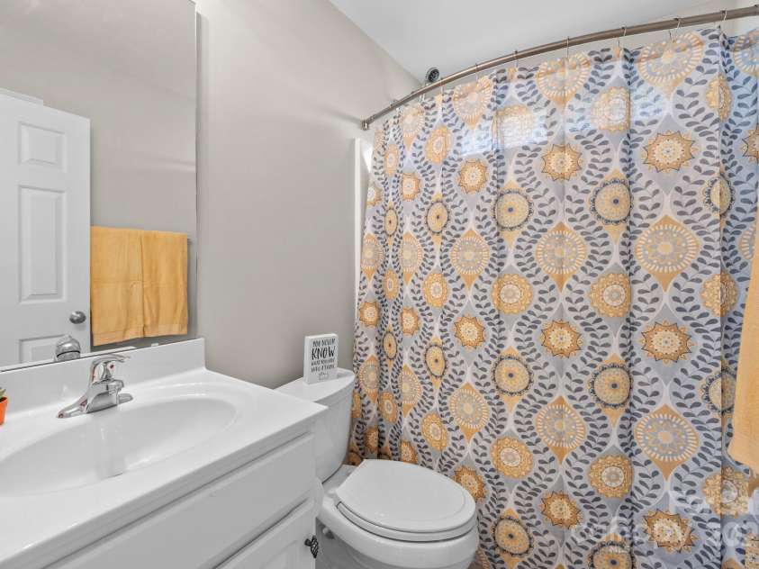 4405 Zee Court, Monroe, NC 28110.  MLS# CAR4224337, YatesRealty ID 14939. Secondary Bath between bedrooms 2 & 3