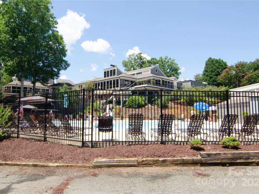 64 Timberidge Drive, Lake Wylie, SC 29710.  MLS# CAR4257751, YatesRealty ID 14944. Pool area - view to clubhouse