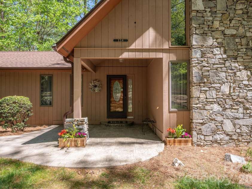 114 Timber Creek Road, Laurel Park, NC 28739.  MLS# CAR4371818, YatesRealty ID 14946. Covered Patio Front Entry