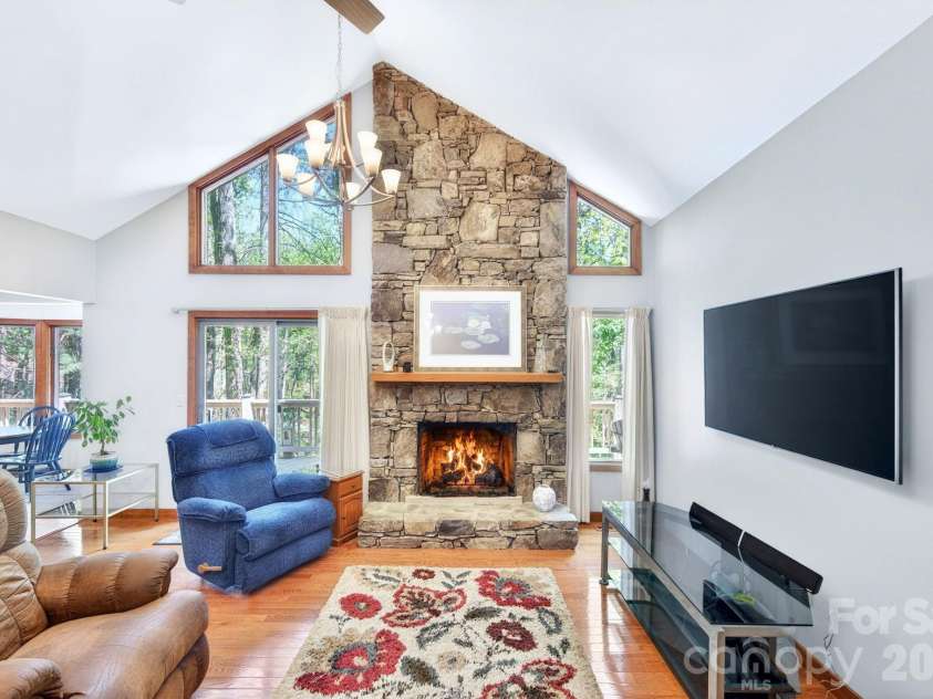 114 Timber Creek Road, Laurel Park, NC 28739.  MLS# CAR4371818, YatesRealty ID 14946. Fireplace w/ Stone Surround