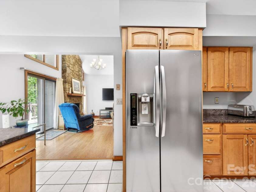 114 Timber Creek Road, Laurel Park, NC 28739.  MLS# CAR4371818, YatesRealty ID 14946. Kitchen Opens to Living Room