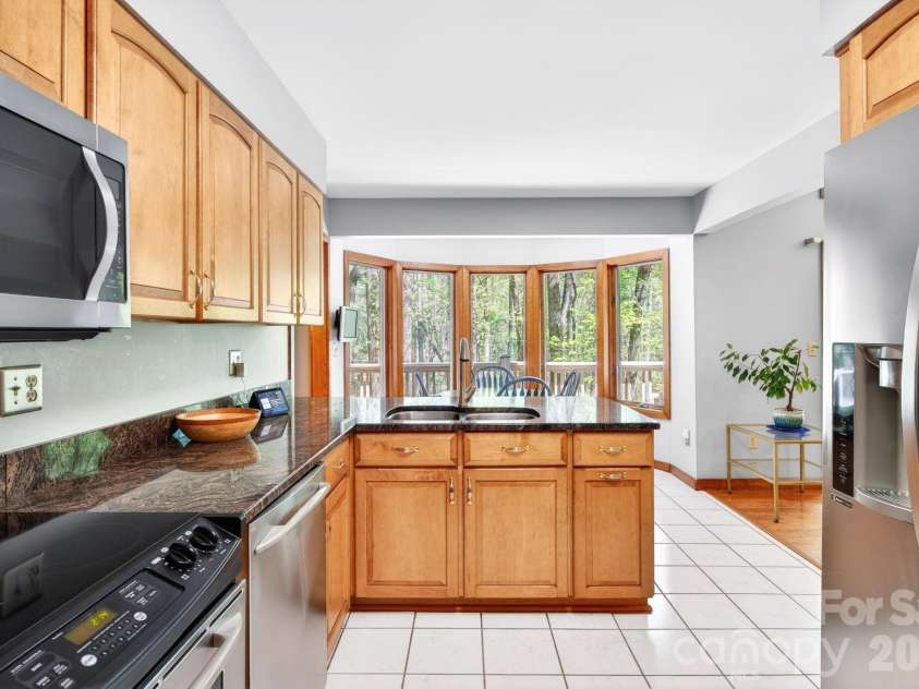 114 Timber Creek Road, Laurel Park, NC 28739.  MLS# CAR4371818, YatesRealty ID 14946. Lovely Bay Window Lets in Light!