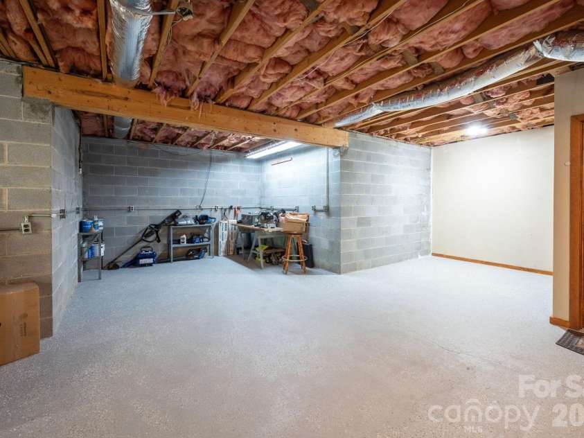 114 Timber Creek Road, Laurel Park, NC 28739.  MLS# CAR4371818, YatesRealty ID 14946. Room for a Workshop