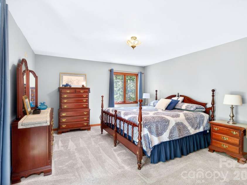 114 Timber Creek Road, Laurel Park, NC 28739.  MLS# CAR4371818, YatesRealty ID 14946. Spacious Primary Bedroom Suite