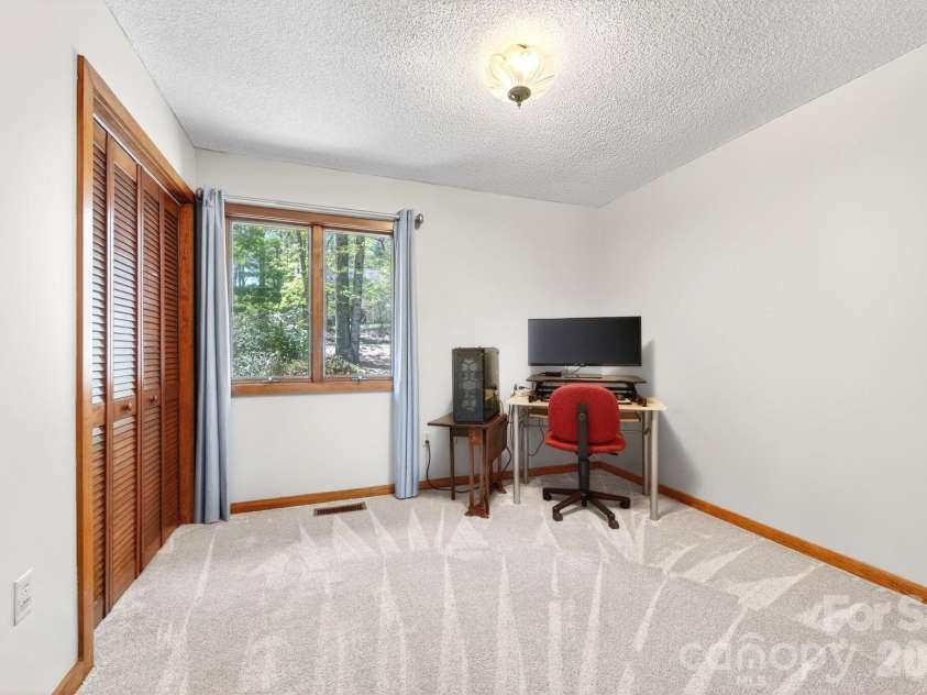 114 Timber Creek Road, Laurel Park, NC 28739.  MLS# CAR4371818, YatesRealty ID 14946. Third Bedroom or Office