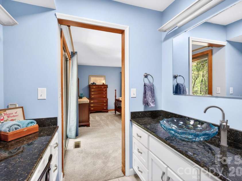 114 Timber Creek Road, Laurel Park, NC 28739.  MLS# CAR4371818, YatesRealty ID 14946. Vanity Area