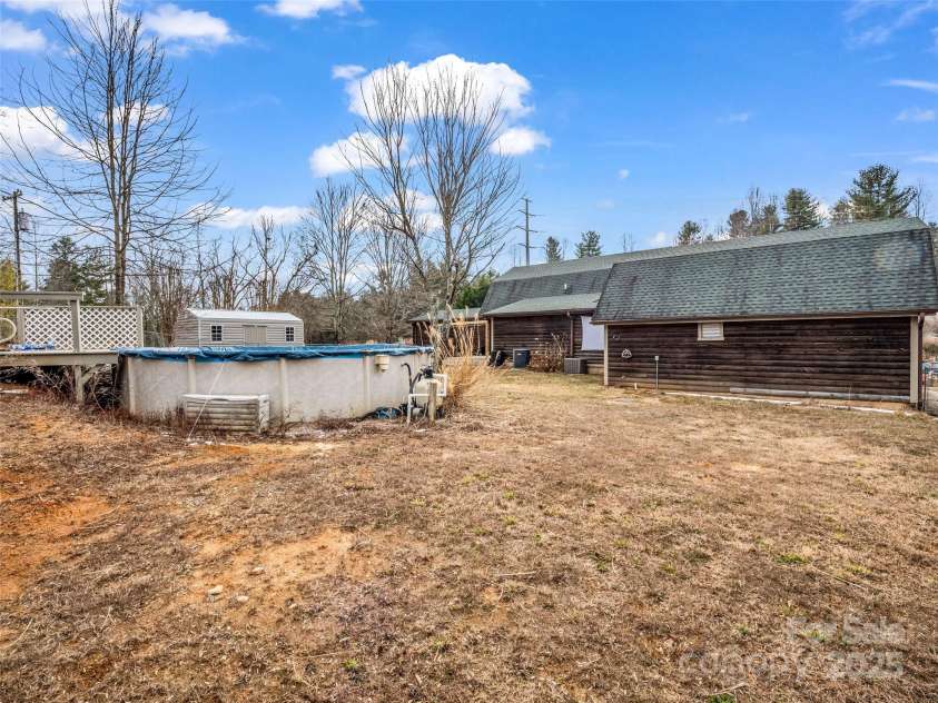 2069 Pot Shoals Road, Saluda, NC 28773.  MLS# CAR4216545, YatesRealty ID 14946. Level Large Back Yard