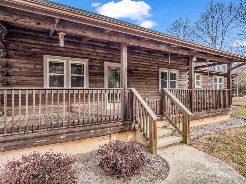2069 Pot Shoals Road, Saluda, NC 28773.  MLS# CAR4216545, YatesRealty ID 14946. Massive Front Porch For Relaxing