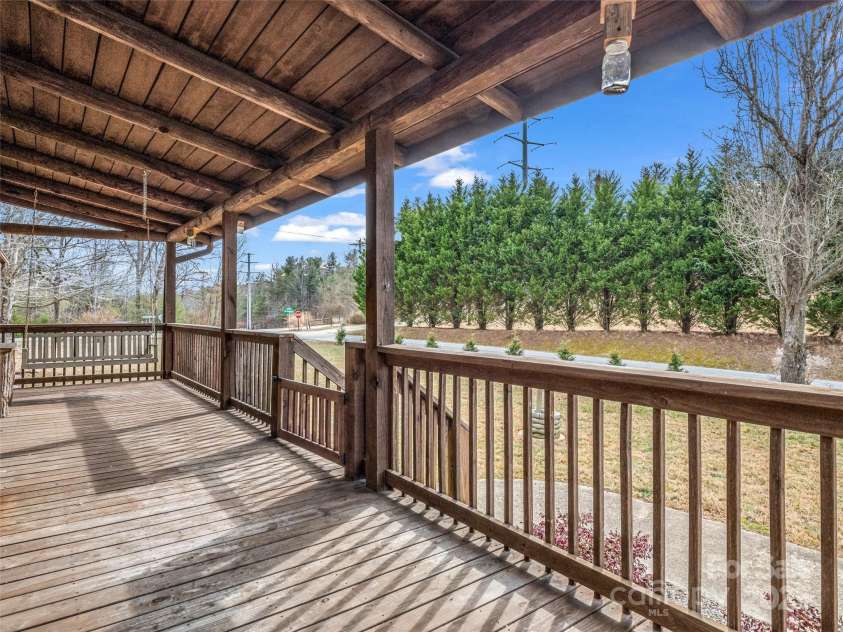2069 Pot Shoals Road, Saluda, NC 28773.  MLS# CAR4216545, YatesRealty ID 14946. Swing and Enjoy The Weather