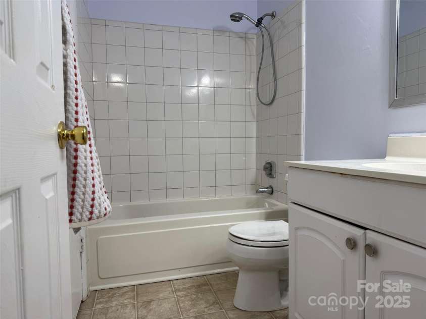 4823 Spring Lake Drive, Charlotte, NC 28212.  MLS# CAR4331709, YatesRealty ID 1495. Hallway full bath connects also to 2nd bedroom