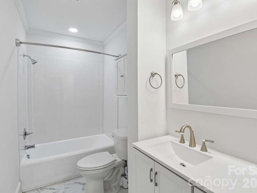 235 6th Street, Albemarle, NC 28001.  MLS# CAR4365910, YatesRealty ID 14952. Hall Bathroom