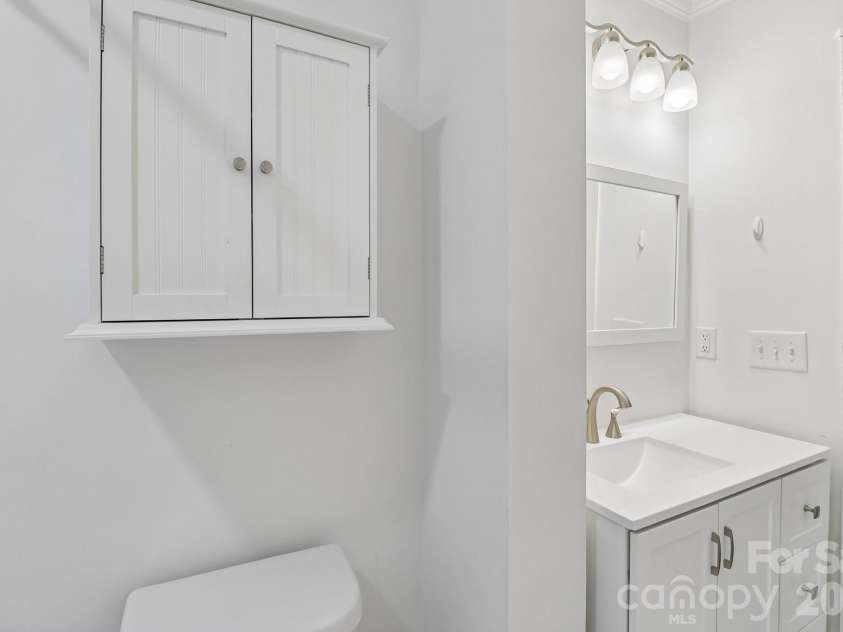 235 6th Street, Albemarle, NC 28001.  MLS# CAR4365910, YatesRealty ID 14952. Hall Bathroom