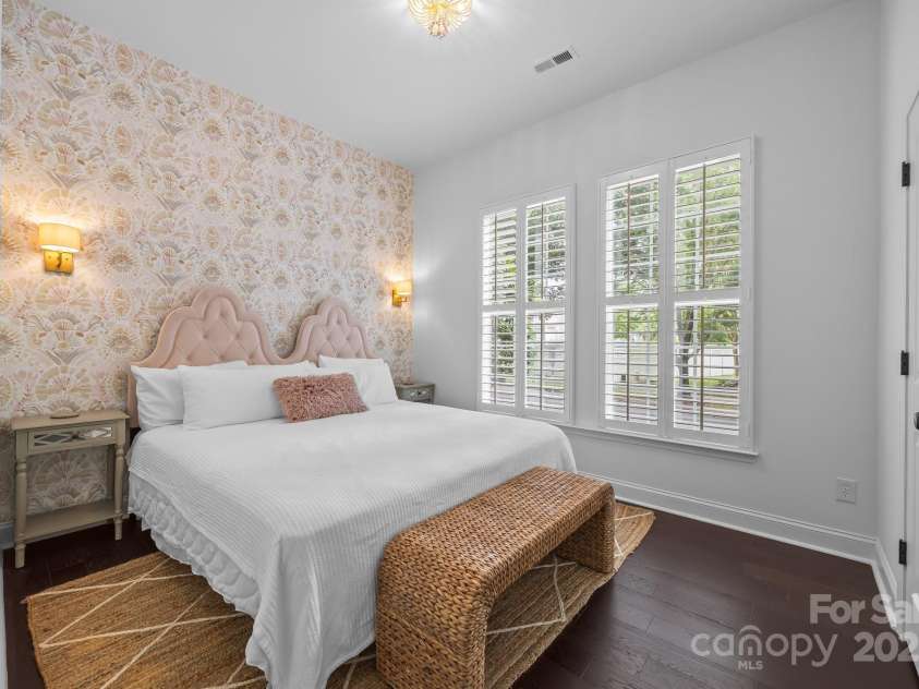 15913 Trenton Place Road, Huntersville, NC 28078.  MLS# CAR4259795, YatesRealty ID 14953. Front secondary bedroom with sconce detail lighting and peel and stick wallpaper