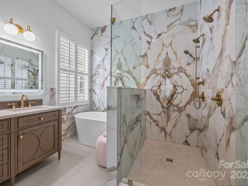 15913 Trenton Place Road, Huntersville, NC 28078.  MLS# CAR4259795, YatesRealty ID 14953. Incredible walk in shower with double showerheads and a handheld wand