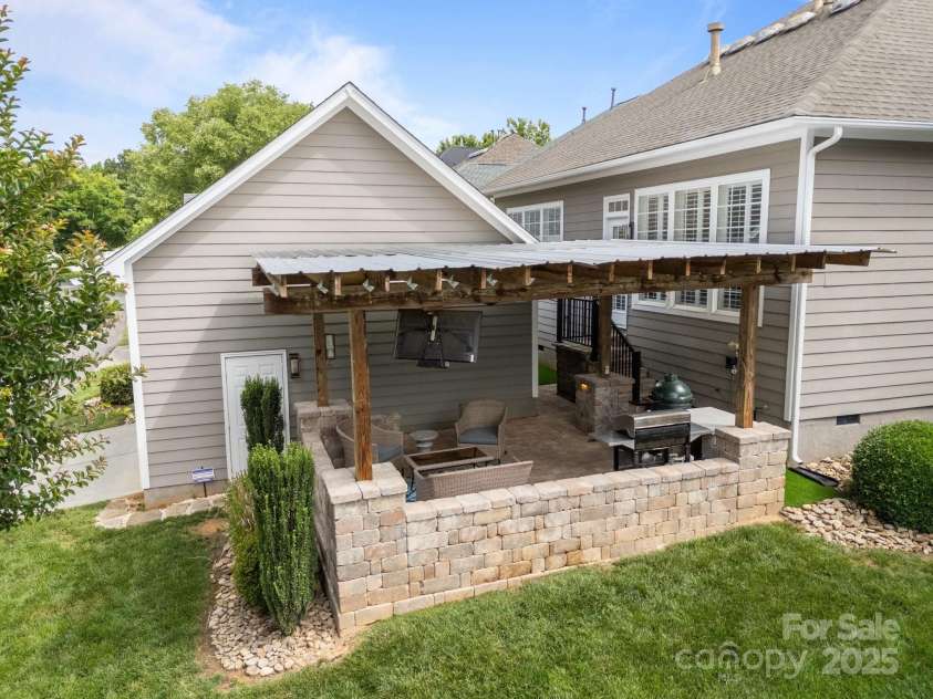 15913 Trenton Place Road, Huntersville, NC 28078.  MLS# CAR4259795, YatesRealty ID 14953. Metal roof over the patio