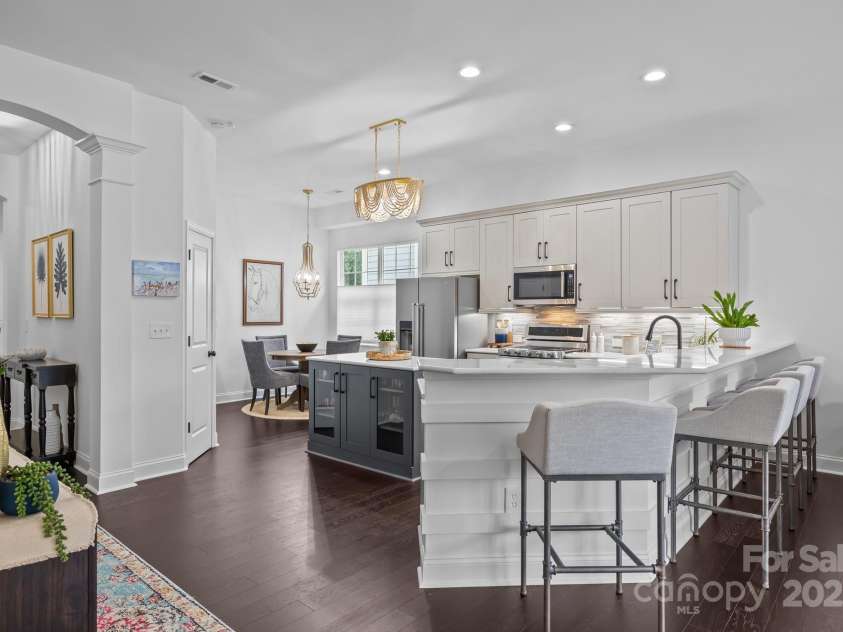 15913 Trenton Place Road, Huntersville, NC 28078.  MLS# CAR4259795, YatesRealty ID 14953. Millwork wraps the bar area