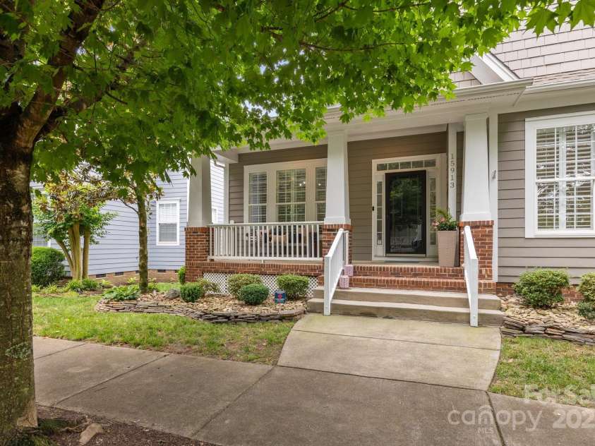 15913 Trenton Place Road, Huntersville, NC 28078.  MLS# CAR4259795, YatesRealty ID 14953. Wide stairway leading into the home from the sidewalk