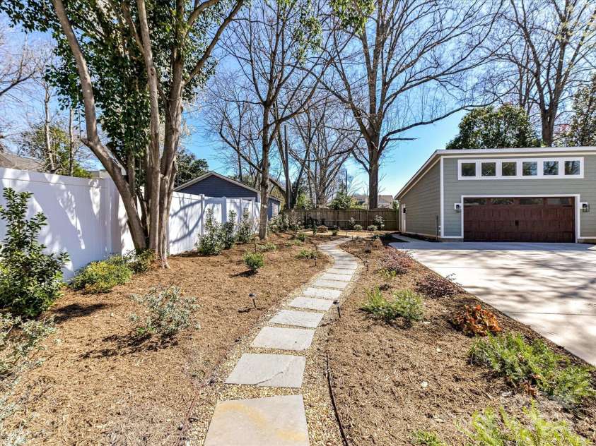 2919 Park Road, Charlotte, NC 28209.  MLS# CAR4230850, YatesRealty ID 14959. Stone Pathway through Backyard to Fire Pit